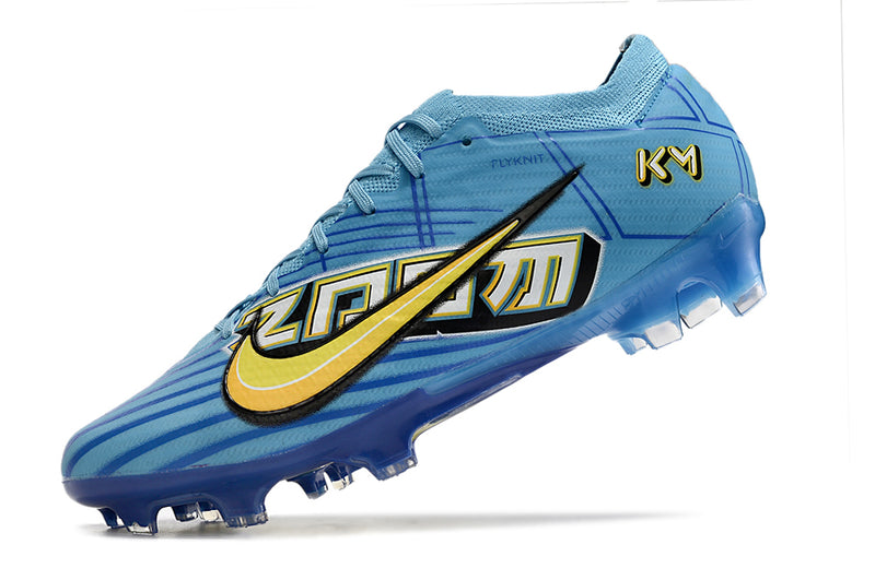 Chuteiras de futebol de campo firmes Kylian Mbappé x Nike Air Zoom Mercurial Vapor 15 Elite FG - Azul/Amarelo/Preto | Football Boots (Cópia)