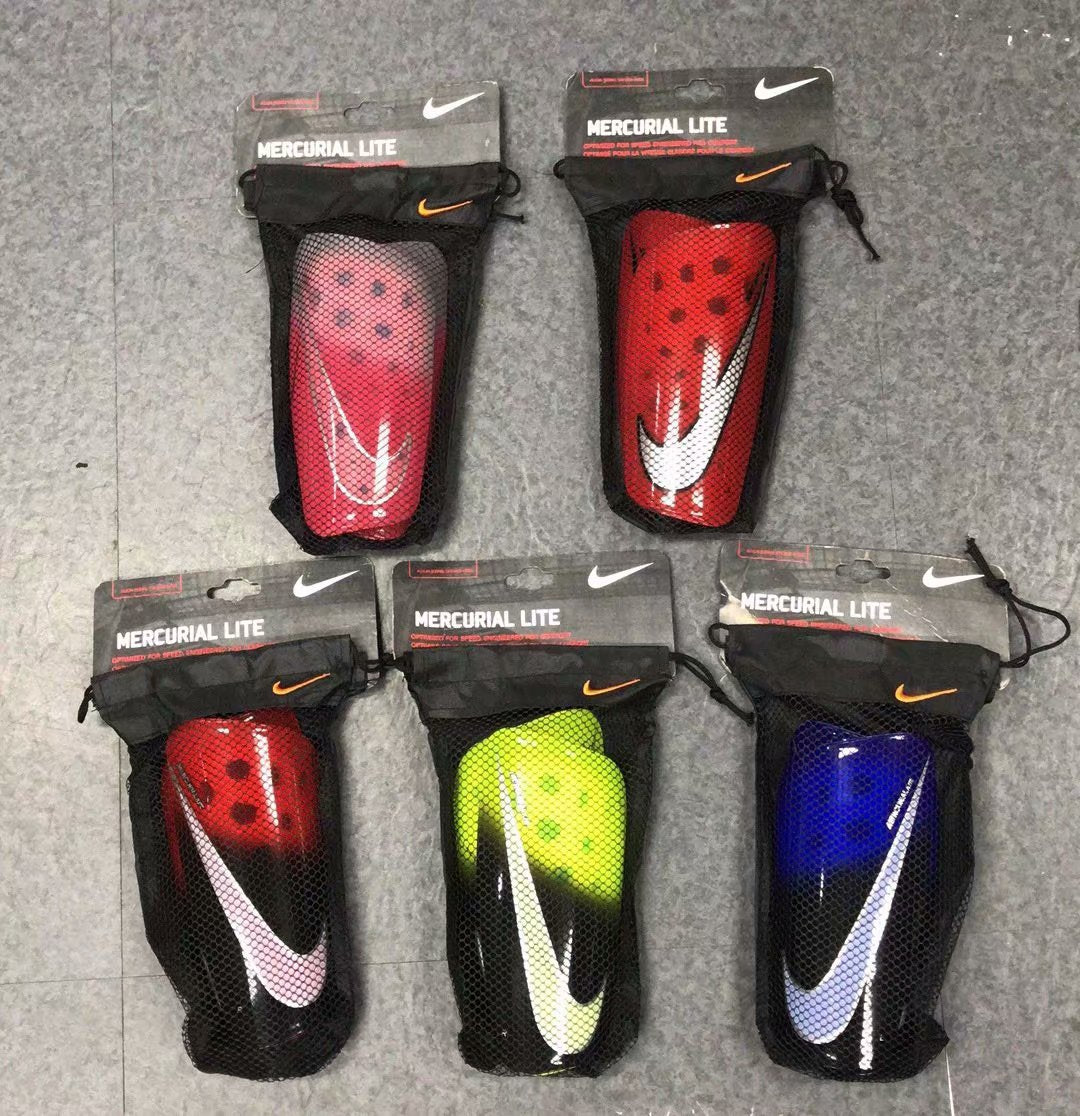 Mercurial Lite Caneleira 19/20 | Acessórios Esportivos (Entregas Acima de 20€)