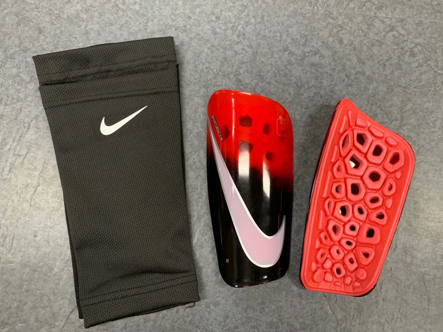 Mercurial Lite Caneleira 19/20 | Acessórios Esportivos (Entregas Acima de 20€)