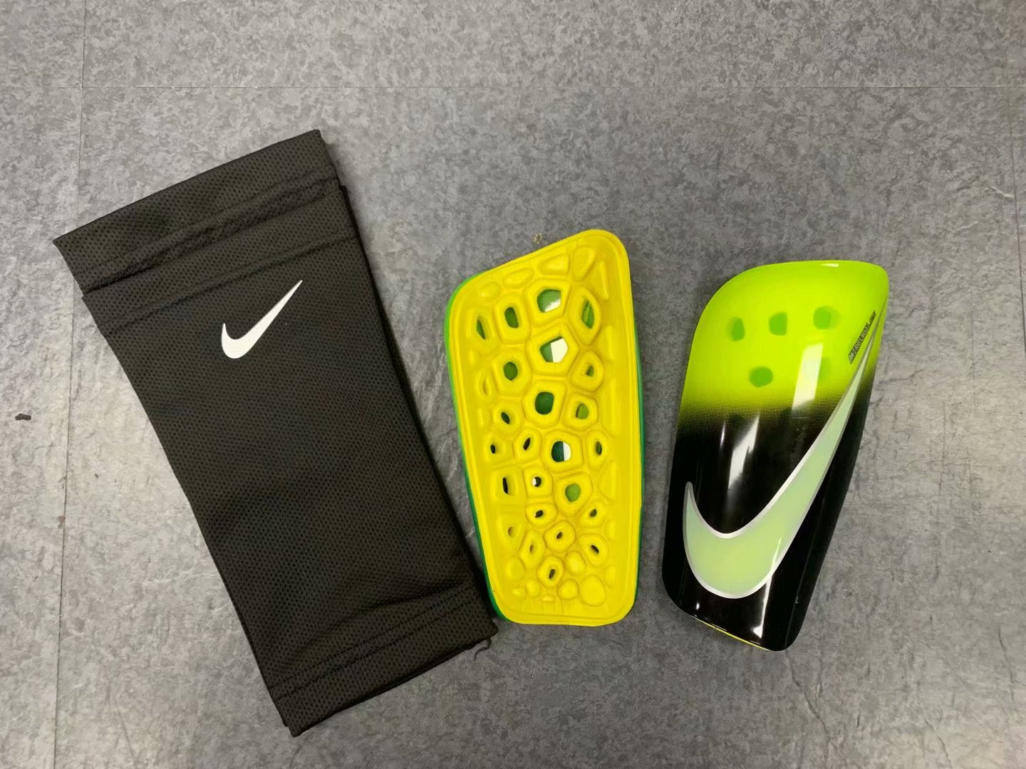 Mercurial Lite Caneleira 19/20 | Acessórios Esportivos (Entregas Acima de 20€)