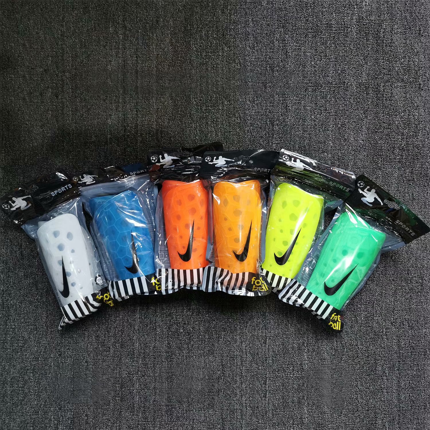 Caneleira Nike Version | Acessórios Esportivos (Entregas Acima de 20€)