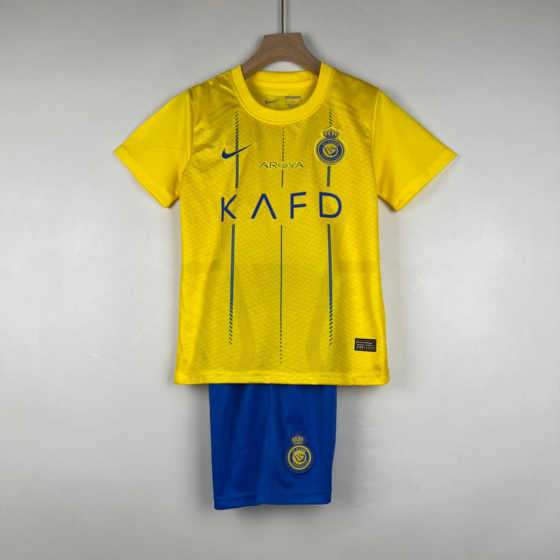 AL NASSR HOME 23/24 KIT INFANTIL