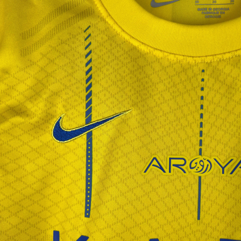 AL NASSR HOME 23/24 KIT INFANTIL