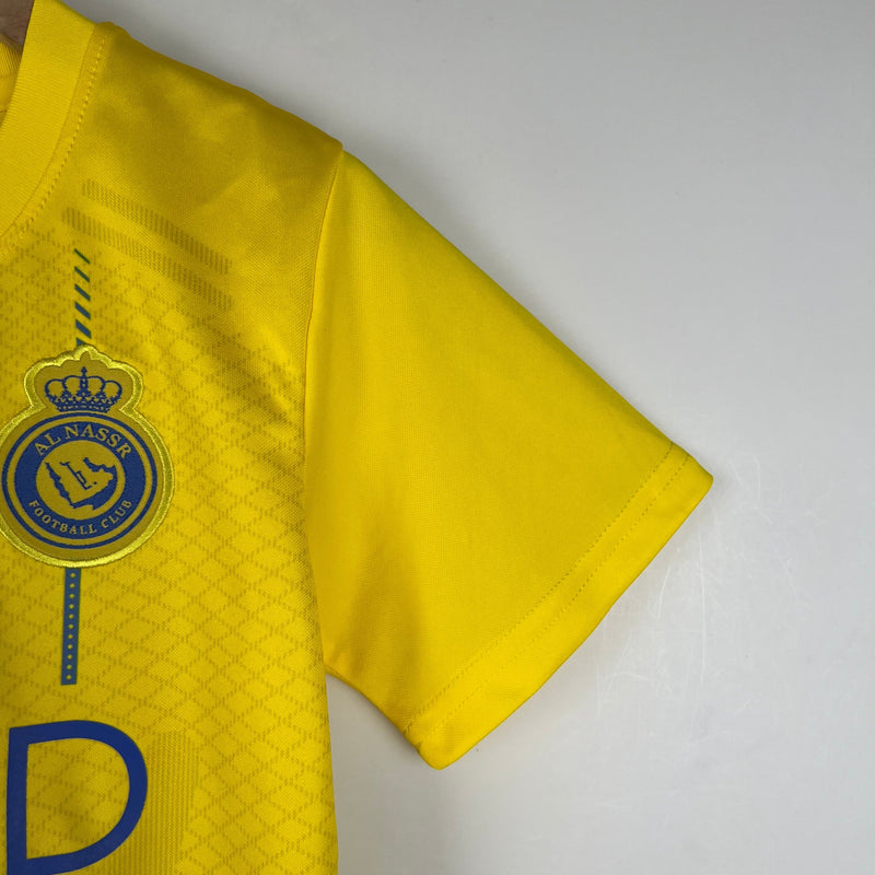 AL NASSR HOME 23/24 KIT INFANTIL