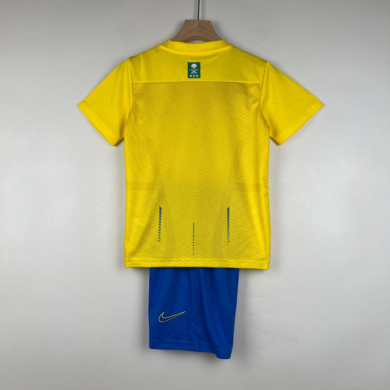 AL NASSR HOME 23/24 KIT INFANTIL